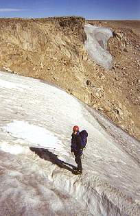 From above, the bergschrund does not look intimidating. It is right in front of Lisa in this picture.